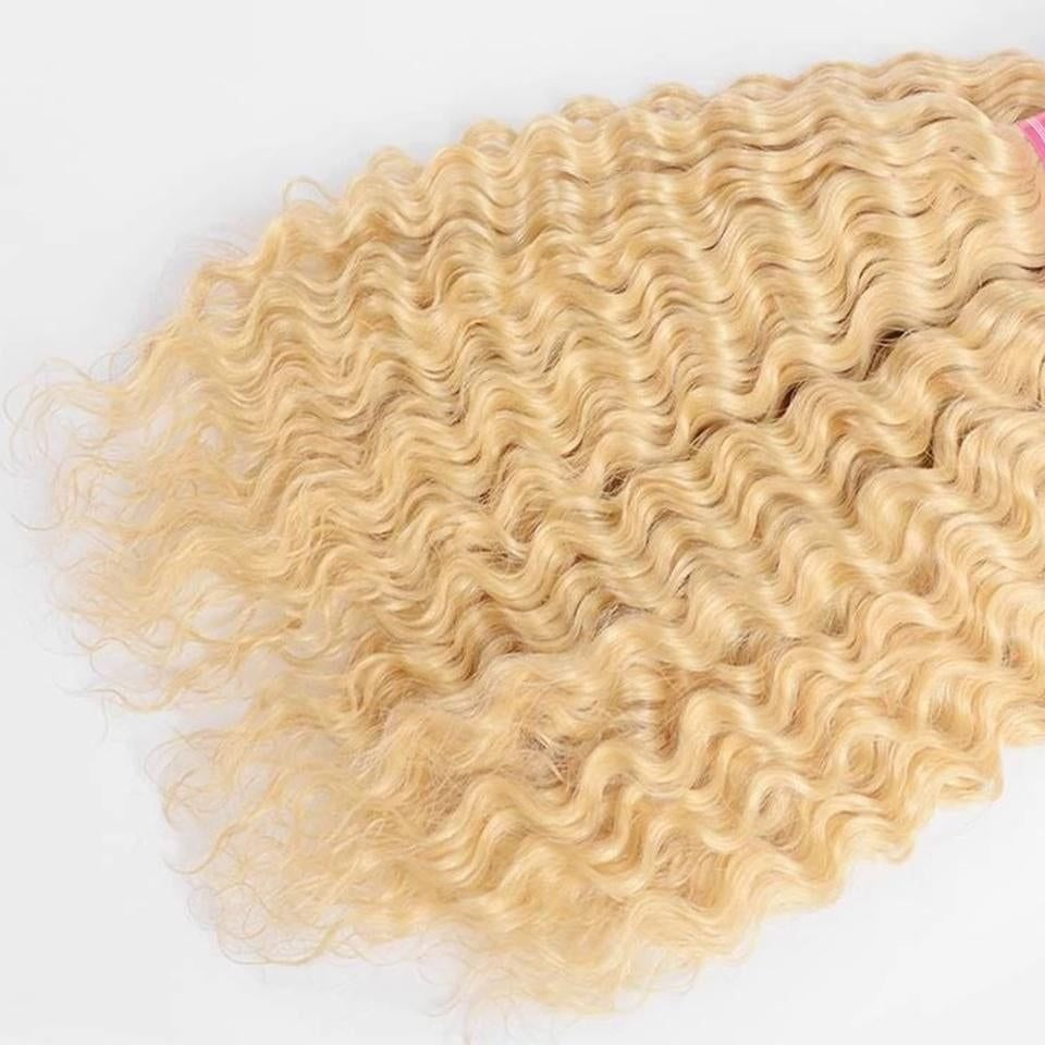 Extensiones rizadas ( rubias extra claras )